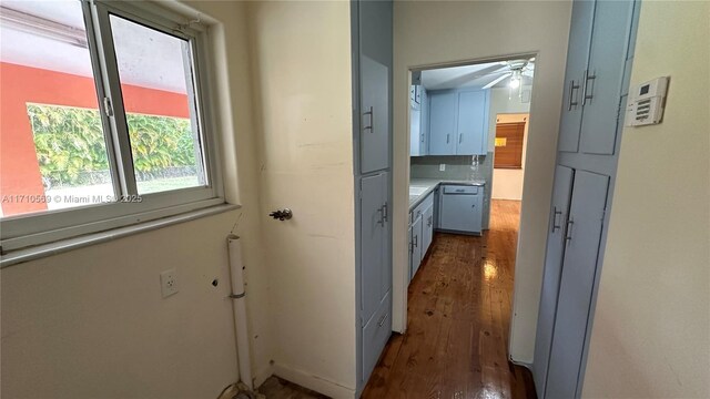 corridor featuring dark hardwood / wood-style flooring