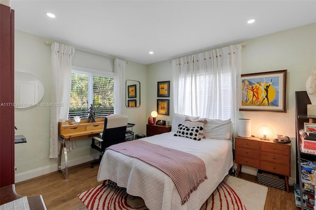 bedroom featuring light hardwood / wood-style flooring