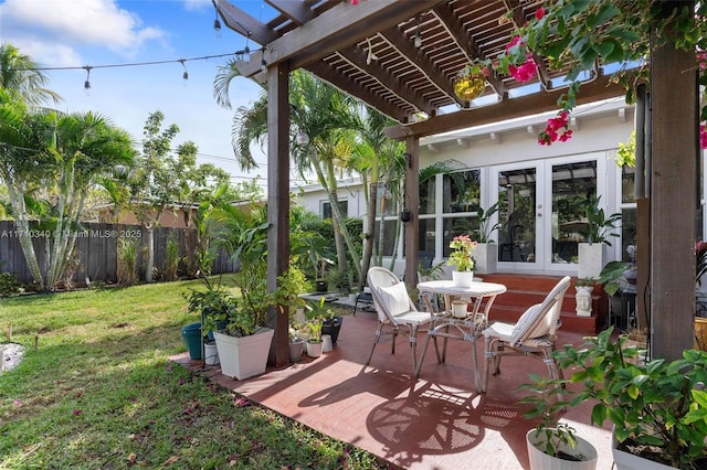 view of patio with a pergola and french doors