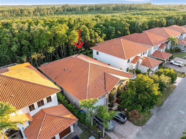 drone / aerial view with a forest view