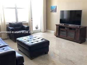 3725 S Ocean Dr Unit 1605, Hollywood, FL 33019 - living area with healthy amount of natural light