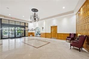 3725 S Ocean Dr Unit 1605, Hollywood, FL 33019 - building lobby featuring a wainscoted wall, recessed lighting, and wooden walls