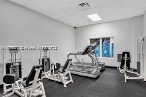 3725 S Ocean Dr Unit 1605, Hollywood, FL 33019 - gym featuring a drop ceiling