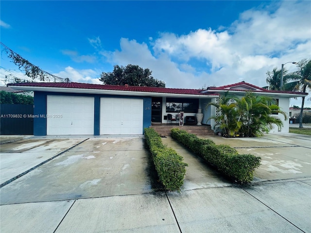 view of front of property featuring a garage