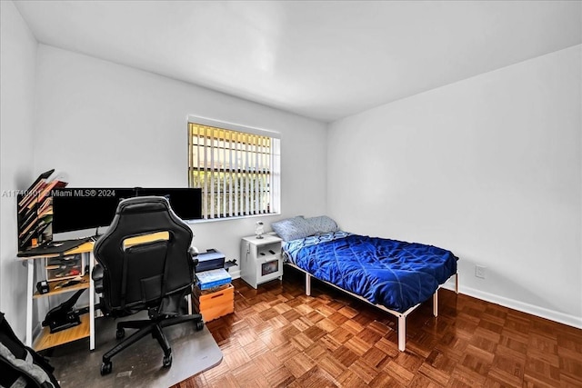 bedroom featuring parquet floors