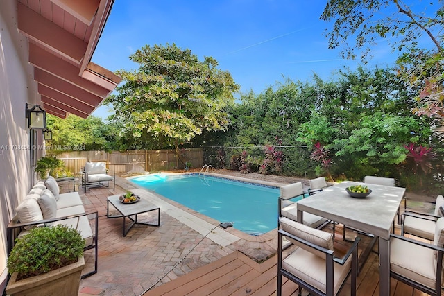 view of pool with outdoor lounge area