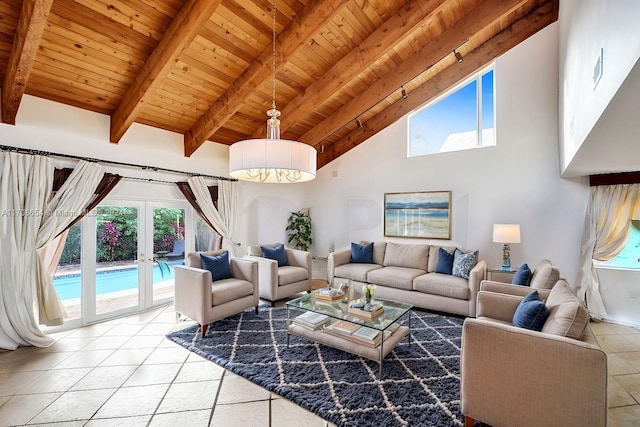 tiled living room featuring beam ceiling, french doors, high vaulted ceiling, and wood ceiling