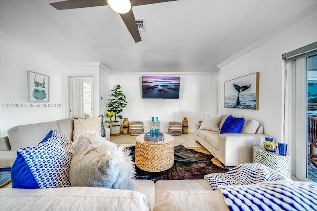 living room with ceiling fan and crown molding