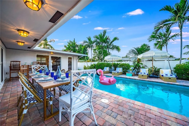 view of pool featuring a patio