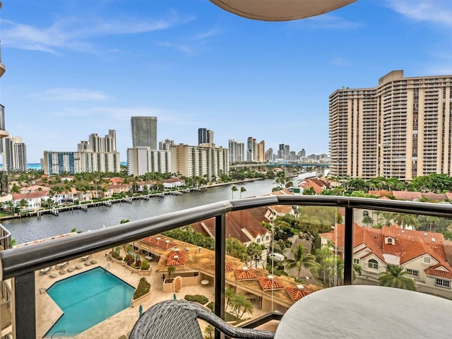 balcony featuring a water view