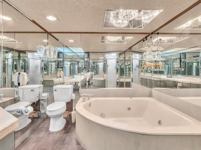 bathroom featuring hardwood / wood-style floors, toilet, and a tub