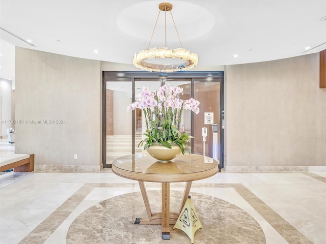 interior space featuring an inviting chandelier