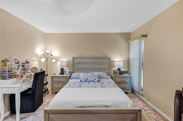 bedroom featuring a textured ceiling