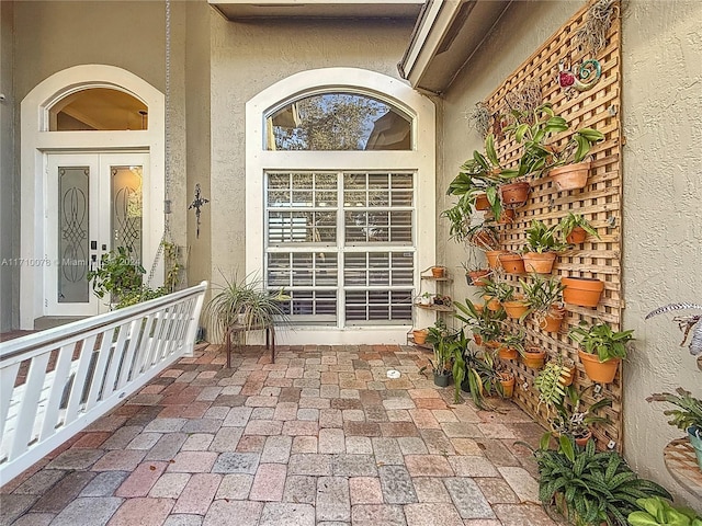 doorway to property featuring a porch