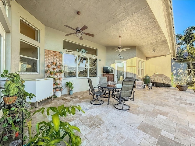 view of patio / terrace featuring ceiling fan