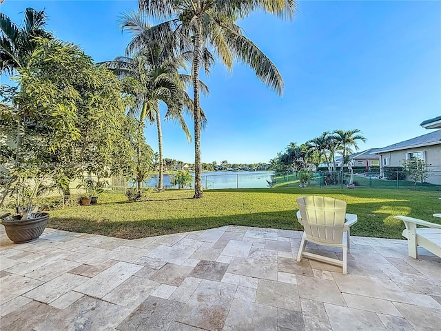 view of patio / terrace with a water view