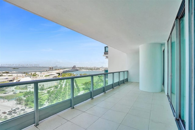 balcony featuring a water view