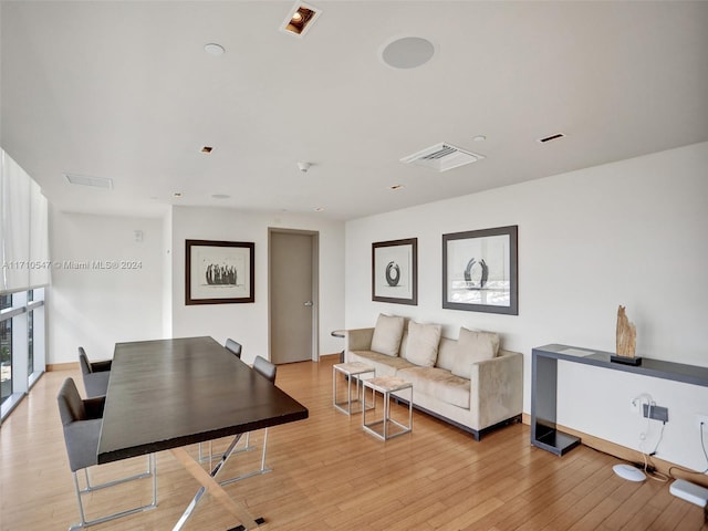 living room with light hardwood / wood-style floors