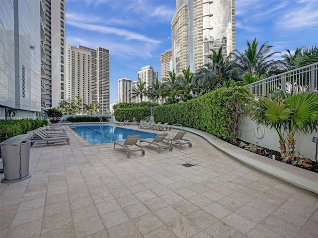 view of pool featuring a patio