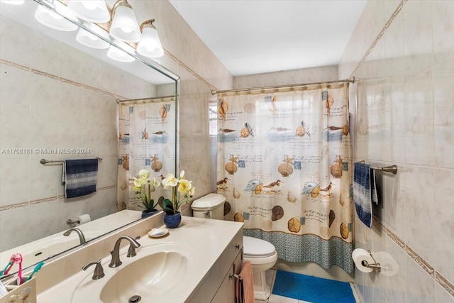 full bathroom with shower / tub combo, vanity, toilet, and tile walls