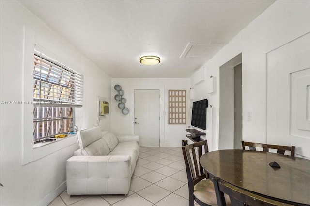 dining space featuring light tile patterned flooring