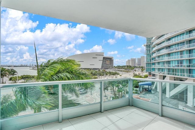 balcony featuring a water view