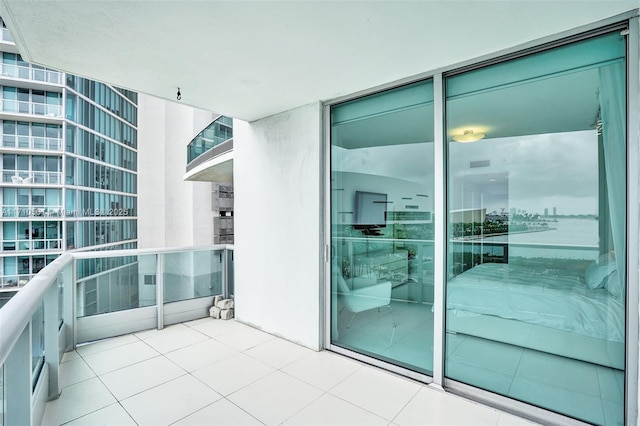 balcony featuring a water view