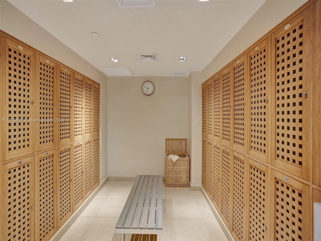 wine area featuring light tile patterned floors