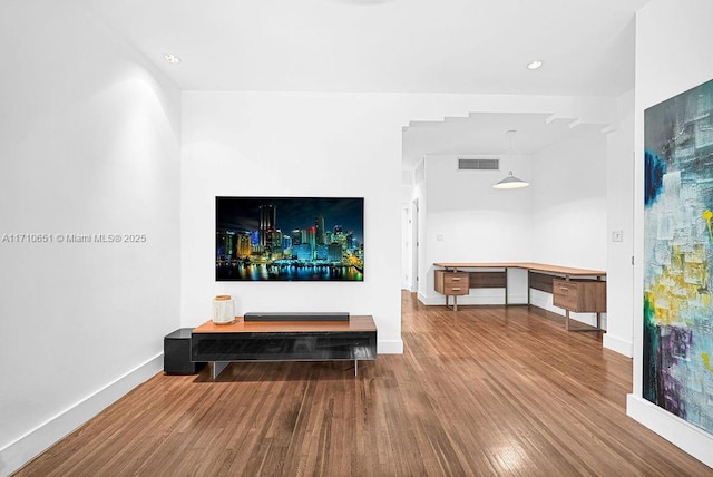 living room with wood-type flooring