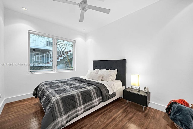 bedroom featuring dark hardwood / wood-style floors and ceiling fan