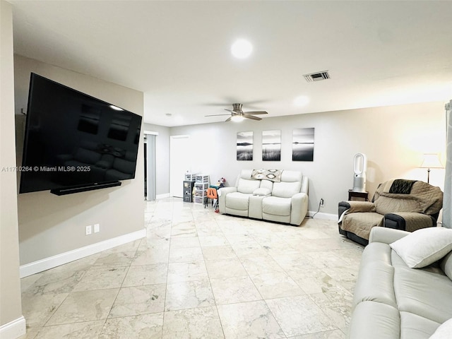 living room featuring ceiling fan