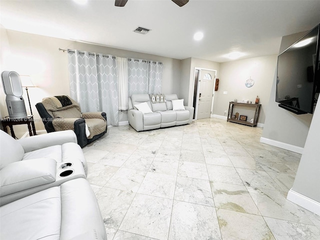 living room featuring ceiling fan