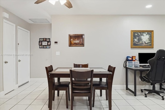 dining room with ceiling fan and light tile patterned floors