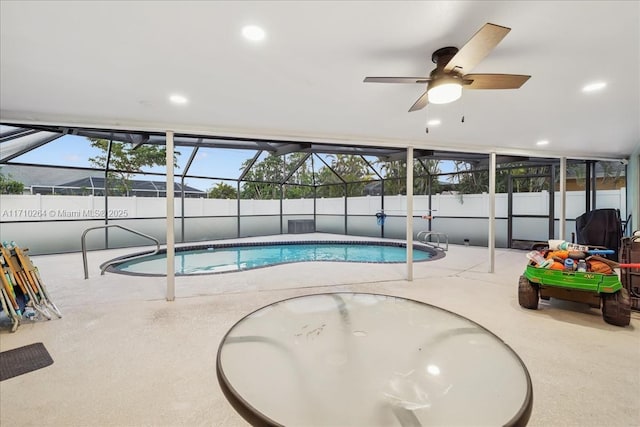 view of pool with ceiling fan