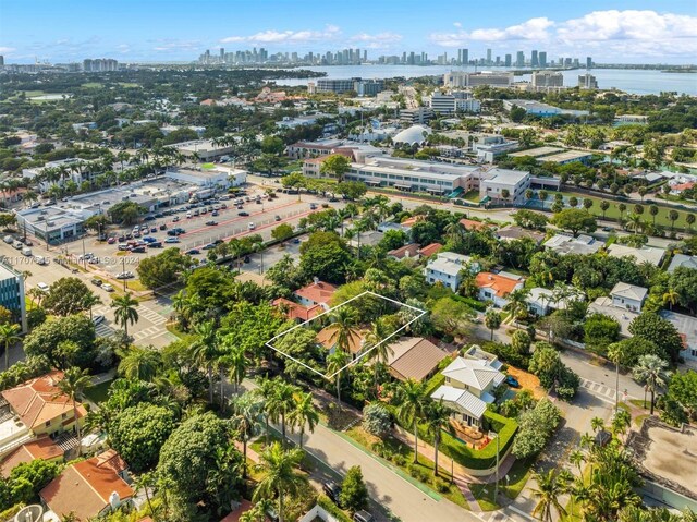 drone / aerial view with a water view