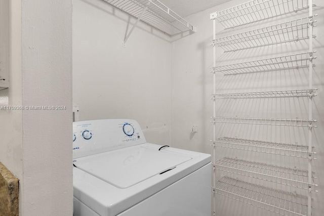 3330 Spanish Moss Ter Unit 109, Lauderhill, FL 33319 - washroom featuring washer / clothes dryer