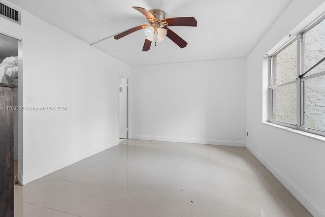 3330 Spanish Moss Ter Unit 109, Lauderhill, FL 33319 - unfurnished room with a ceiling fan