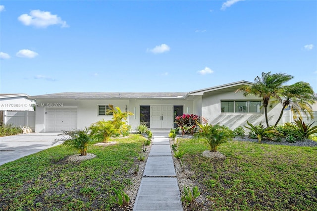 single story home with a garage