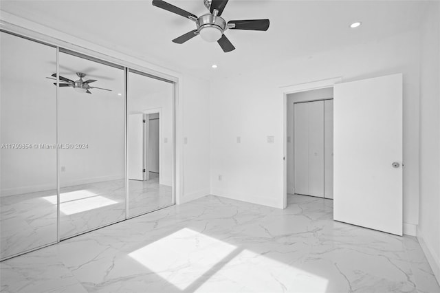 unfurnished bedroom featuring ceiling fan