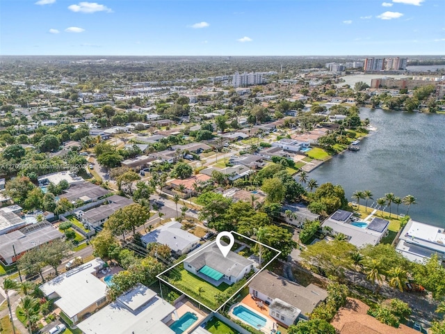 drone / aerial view with a water view