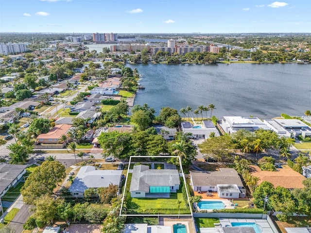 drone / aerial view with a water view