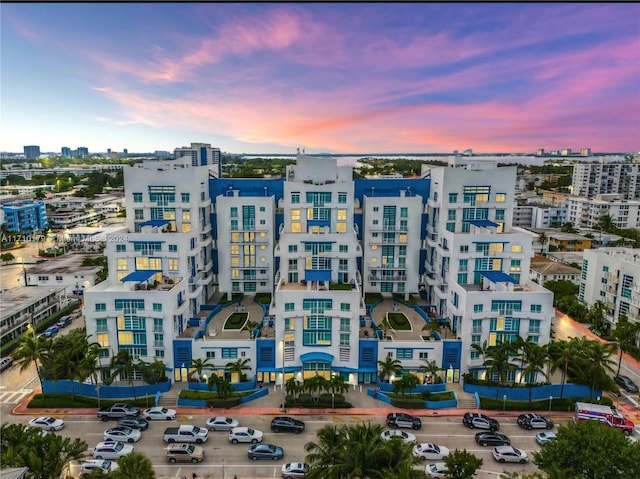 view of outdoor building at dusk