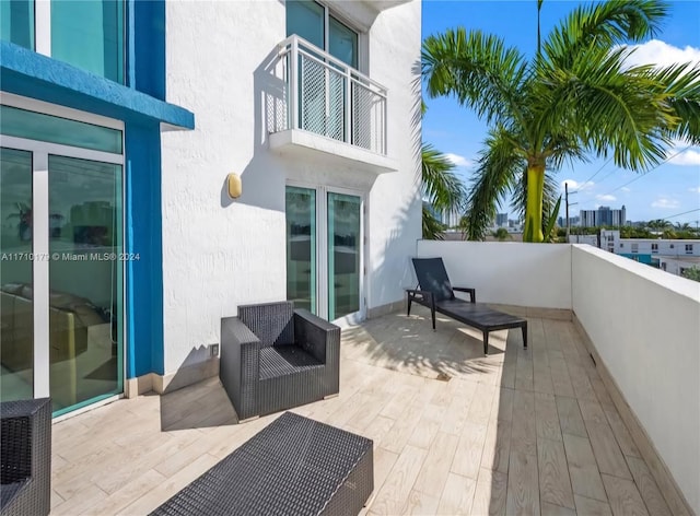 view of patio with a balcony