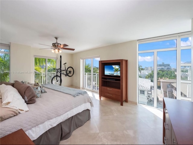 bedroom featuring access to outside and ceiling fan