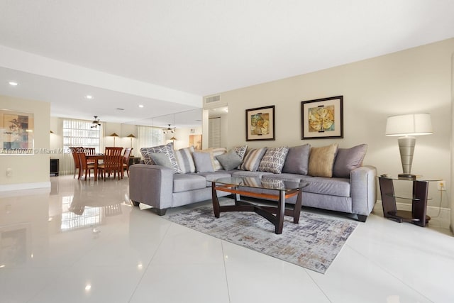 living room with light tile patterned floors