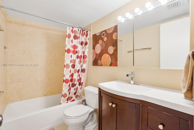 full bathroom featuring toilet, vanity, and shower / tub combo with curtain