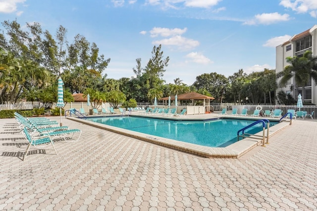 view of swimming pool featuring a patio area