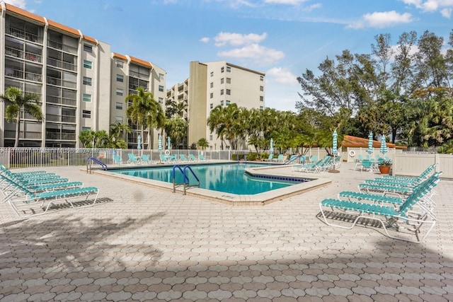 view of swimming pool with a patio area