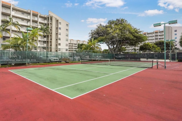 view of sport court featuring basketball hoop