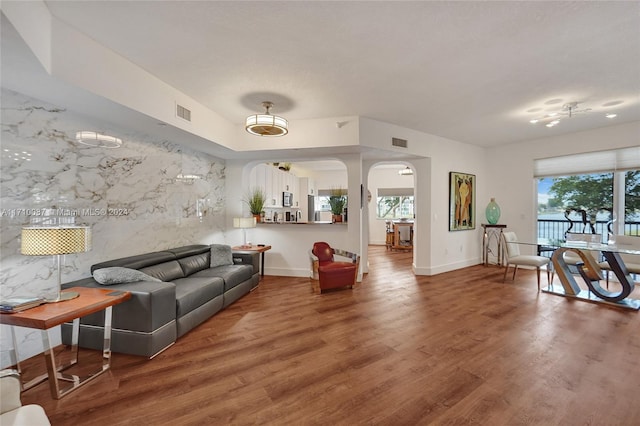 living room with wood-type flooring